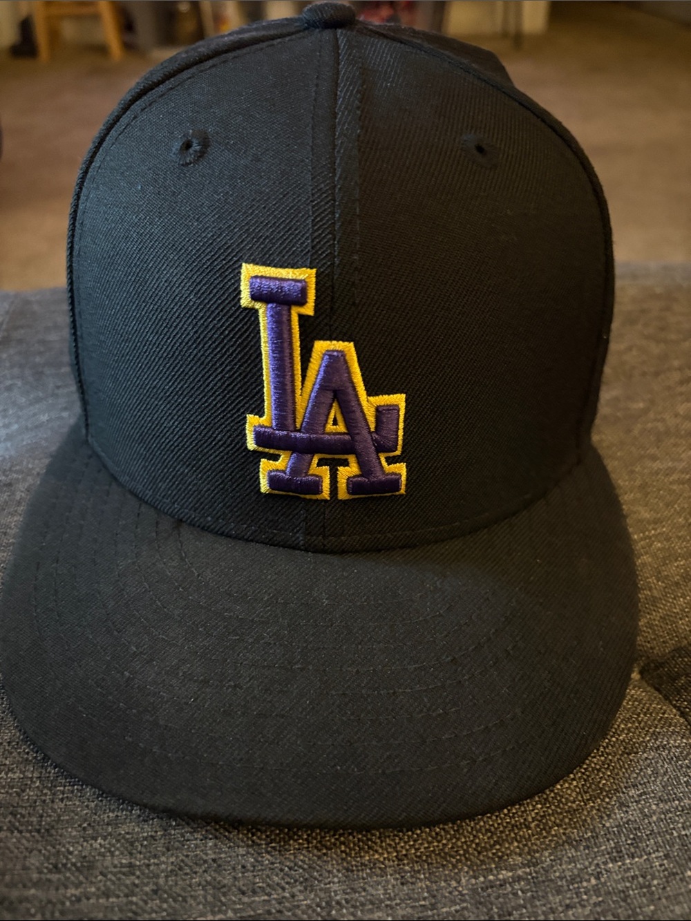 New Era Black LA Dodgers Hat with Purple and Yellow Logo